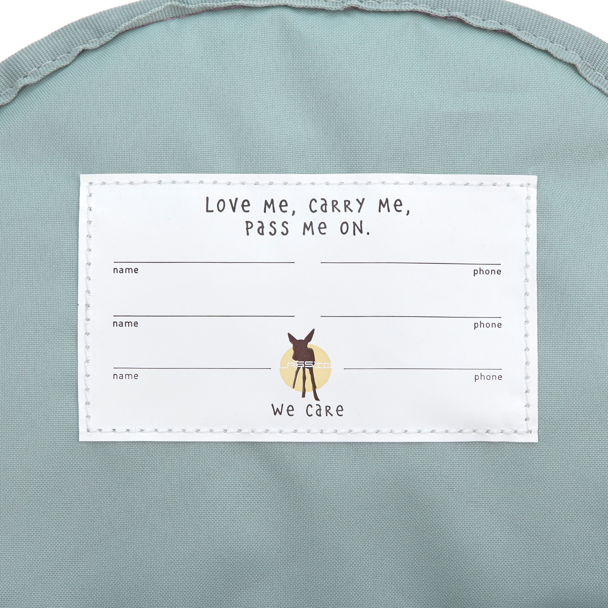 A close up of the name tag on the inside of the Lassig kids tiny bunny backpack.