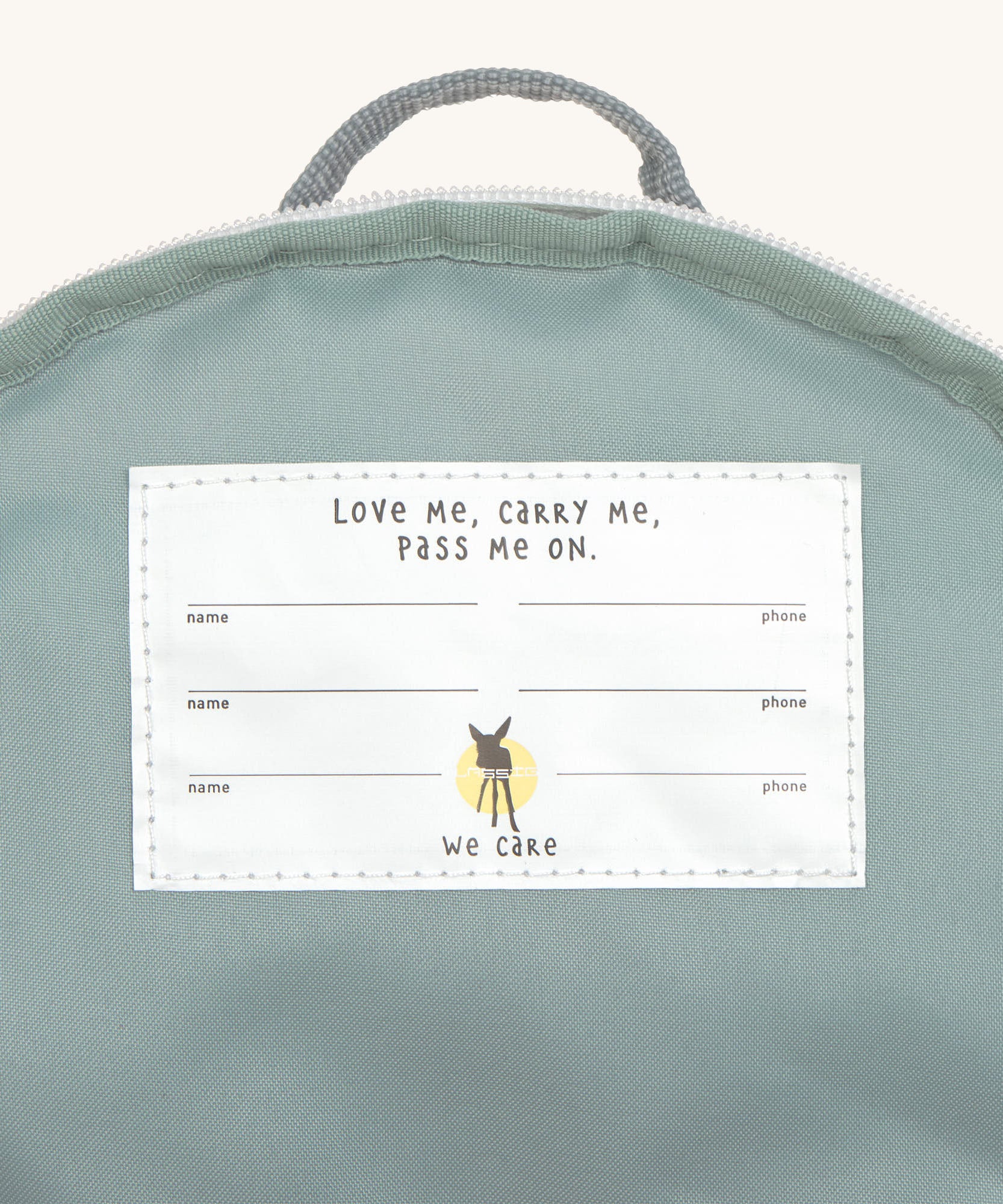 A close up of the name tag on the inside of the Lassig kids tiny koala backpack.