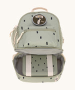 The inside of the Lassig kids mini olive happy print backpack showing a lunchbox inside the bottom compartment.
