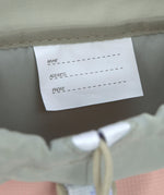 A close up of the name tag on the Lassig kids mini outdoor backpack.