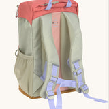 The back of the Lassig kids mini outdoor backpack in sunny explorer pink showing the padded shoulders and mesh side pocket detail.