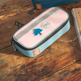 Lassig spacy school pencil case in navy and pink with cute decorative patches on a wooden desk