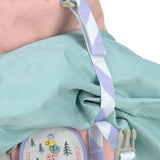 A close up of the name tag on the Lassig kids mini outdoor backpack in explorer pink showing the buckle fastener and cute patch detail