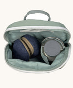 A close up of the Lassig kids tiny digger backpack showing the bottle holder detail and space inside the main compartment of the backpack
