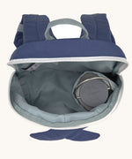 A close up of the Lassig kids tiny backpack in whale showing the bottle holder detail inside the backpack