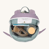 A close up of the Lassig kids tiny bunny backpack showing the bottle holder detail and space inside the main compartment of the backpack