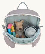 A close up of the Lassig kids tiny koala backpack showing the bottle holder detail and space inside the main compartment of the backpack