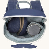 A close up of the Lassig kids tiny whale backpack showing the bottle holder detail and space inside the main compartment of the backpack