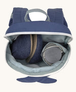 A close up of the Lassig kids tiny whale backpack showing the bottle holder detail and space inside the main compartment of the backpack