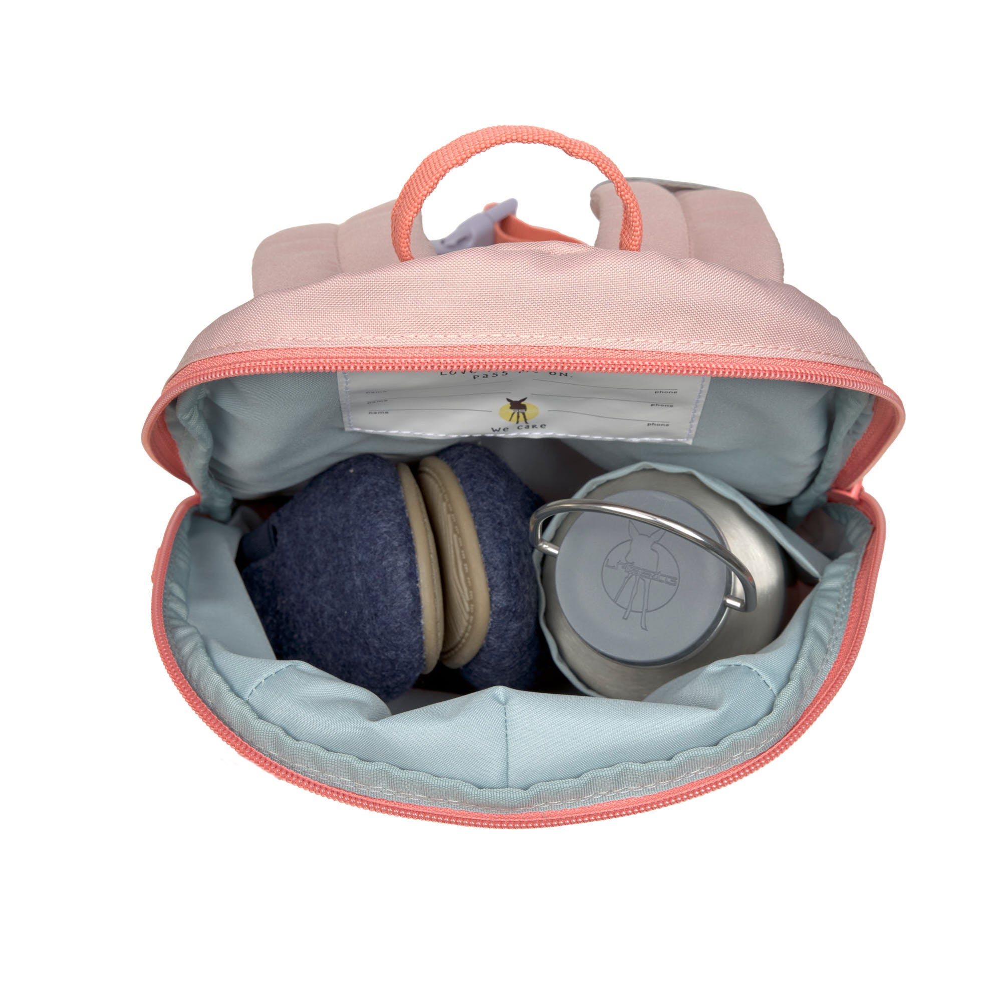 A top view of the Lassig tiny backpack, showing that it can store a pair of shoes and a water bottle.