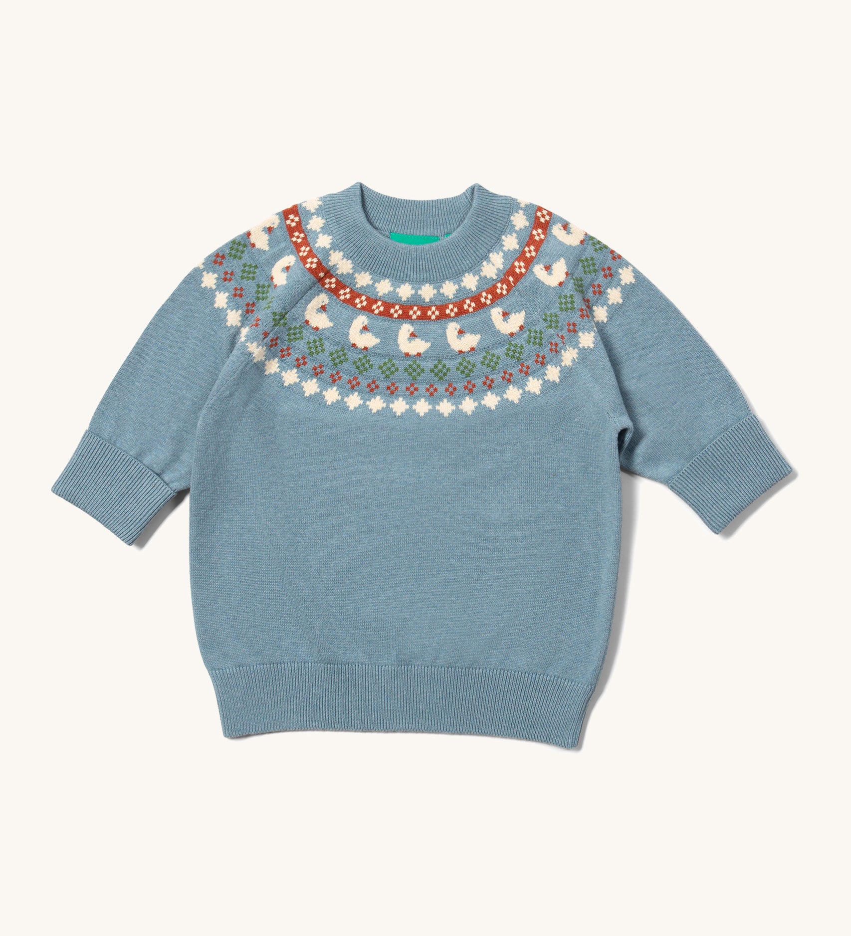 Little Green Radicals fairisle knitted jumper in little ducks available at Babipur. A GOTS organic cotton jumper in a soft knit style in light blue with a little duck fairisle design on the top. Features soft elasticated cuffs and hem for a comfortable fit.