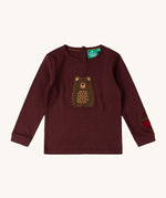 Little Green Radicals teddy bear applique long sleeve t shirt available at Babipur. A GOTS organic cotton long sleeve top in dark maroon with a cute brown bear appliqué on the front and apple on the arm