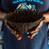 A finished Crescent Moon Bowl, handmade by a refugee