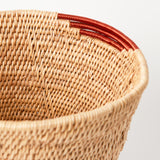 A close up of the copper wire weaving on the MADE51 Small Handmade Makenge Basket