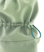 A close up of the Mamalila  baby allrounder winter booties in mint green available at Babipur showing the toggle detail