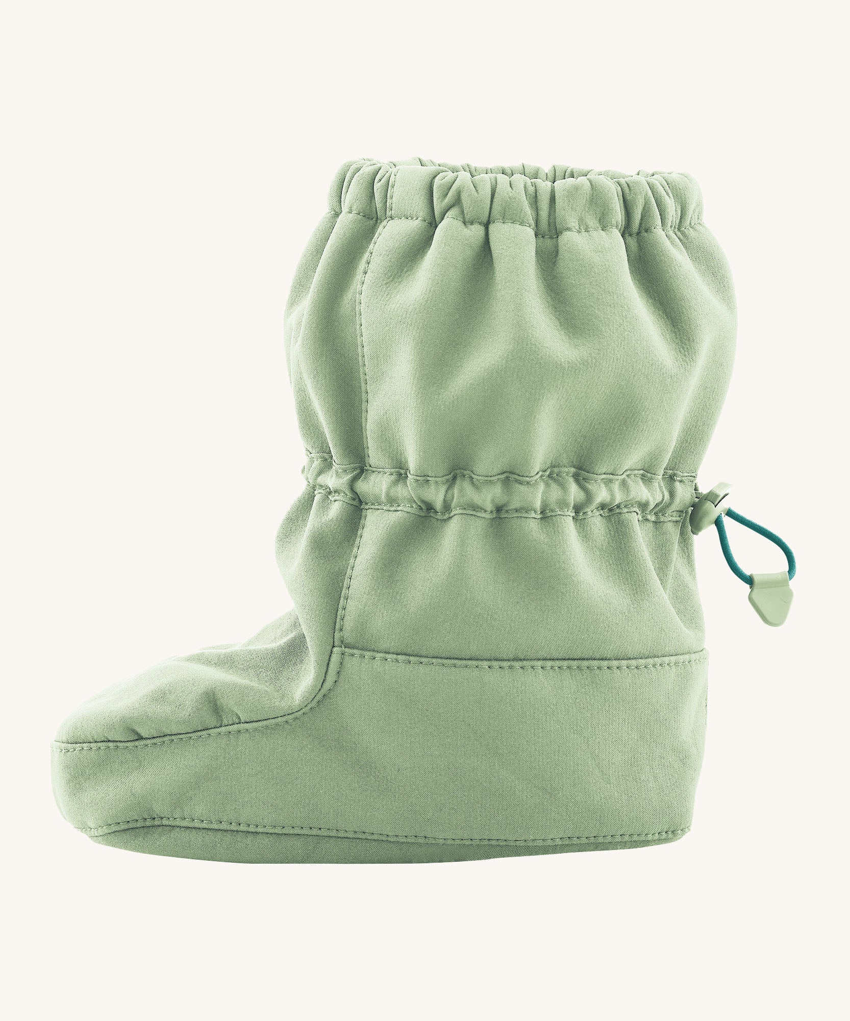 Side image of the Mamalila baby allrounder winter booties in mint green colour available at Babipur showing the elasticated ankle cuff detail
