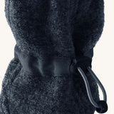 Mamalila Baby Wool Booties - in navy blue. Baby booties made from upcycled boiled wool available at Babipur. Photo shows elastic pull string ankle fastening