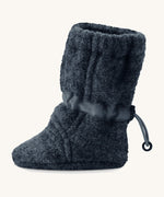 Side image of a Mamalila Baby Wool Booties - in navy blue. Baby booties made from upcycled boiled wool and available at Babipur.