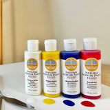 A set of the Natural Earth Paint on a canvas showing the titanium white, brilliant yellow, ultramarine blue and scarlet red colours.