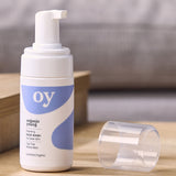 The OY Face wash pump bottle stood next to the lid