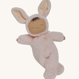 Olli Ella cozy dinkum bunny pip doll in pink colour posing. This fluffy toy doll has a sleeping face, cute floppy ears and available at Babipur.