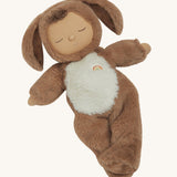 A posing Olli Ella cozy dinkum dog Digby doll available at Babipur. This cosy and fluffy toy doll has a sleeping face and cute floppy ears