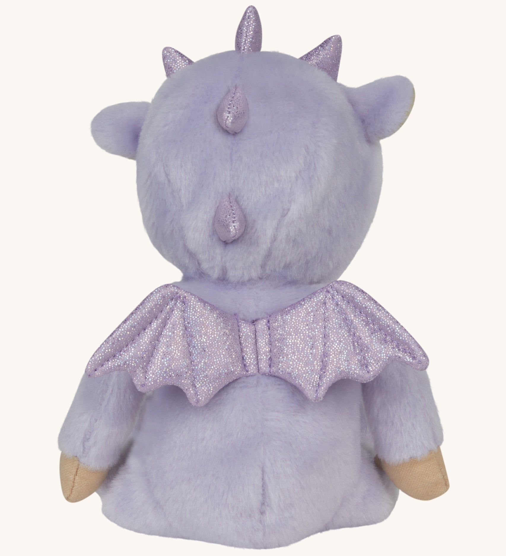 An image showing the back of the Olli Ella Duffy the dragon dinky dinkum doll showing the dragon wings detail.