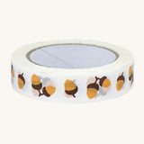 Babipur Acorn Eco Paper Tape in white, with a repeat acorn print. On a cream backgorund
