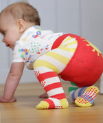 A closer look at the red and yellow stripe, and dot grippers on the Piccalilly Hotchpotch Crawler Tights