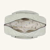 The Avery Row Nappy Changing Bag - Sage, open showing the lining and compartments inside