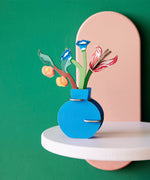 Studio Roof Dutch Masters inspired bouquet 3D pop out card decoration available at Babipur displayed on a white table against a green wall