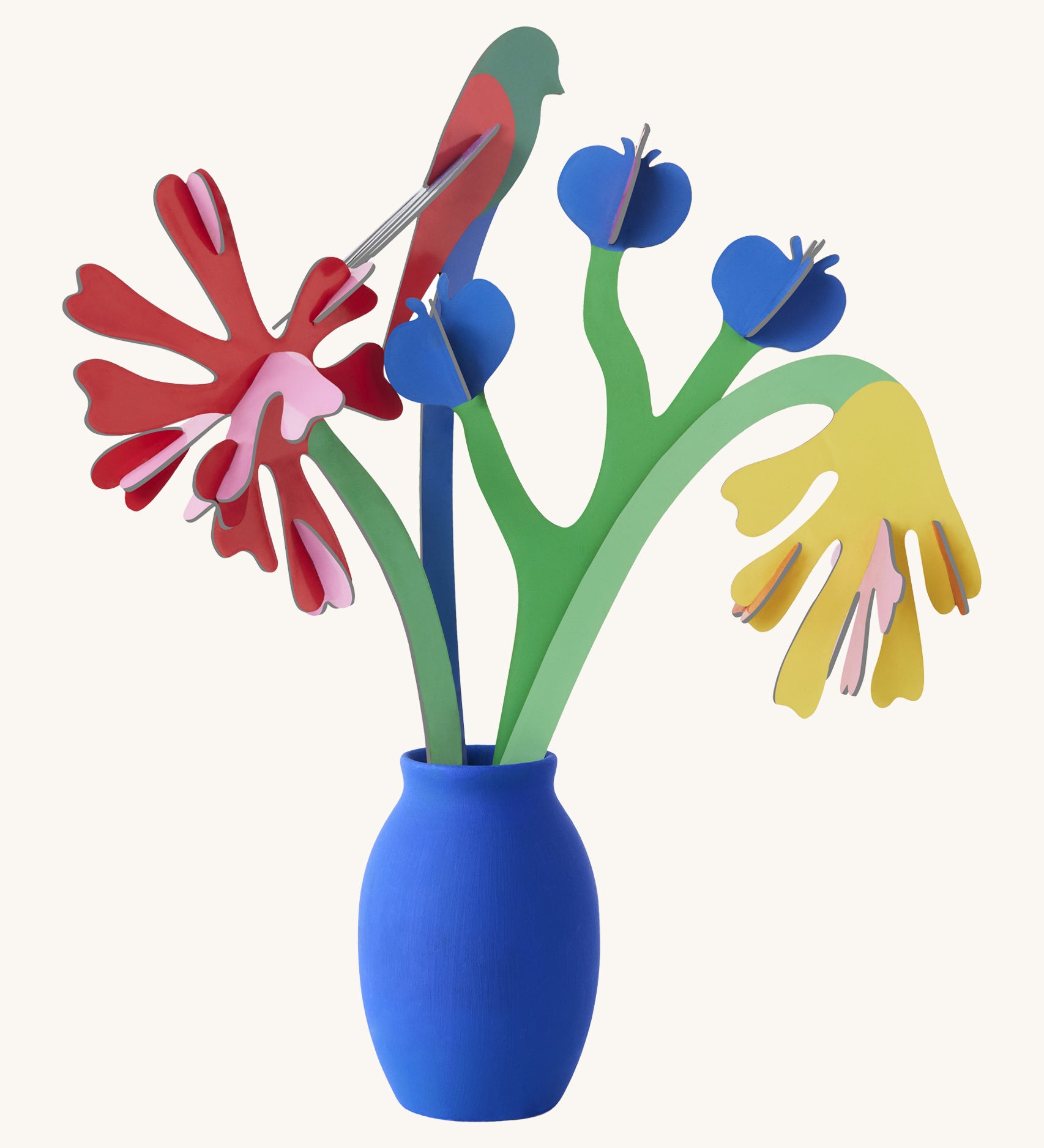 Studio roof small small paper bloom Matisse bouquet with  available at Babipur displayed in a blue vase