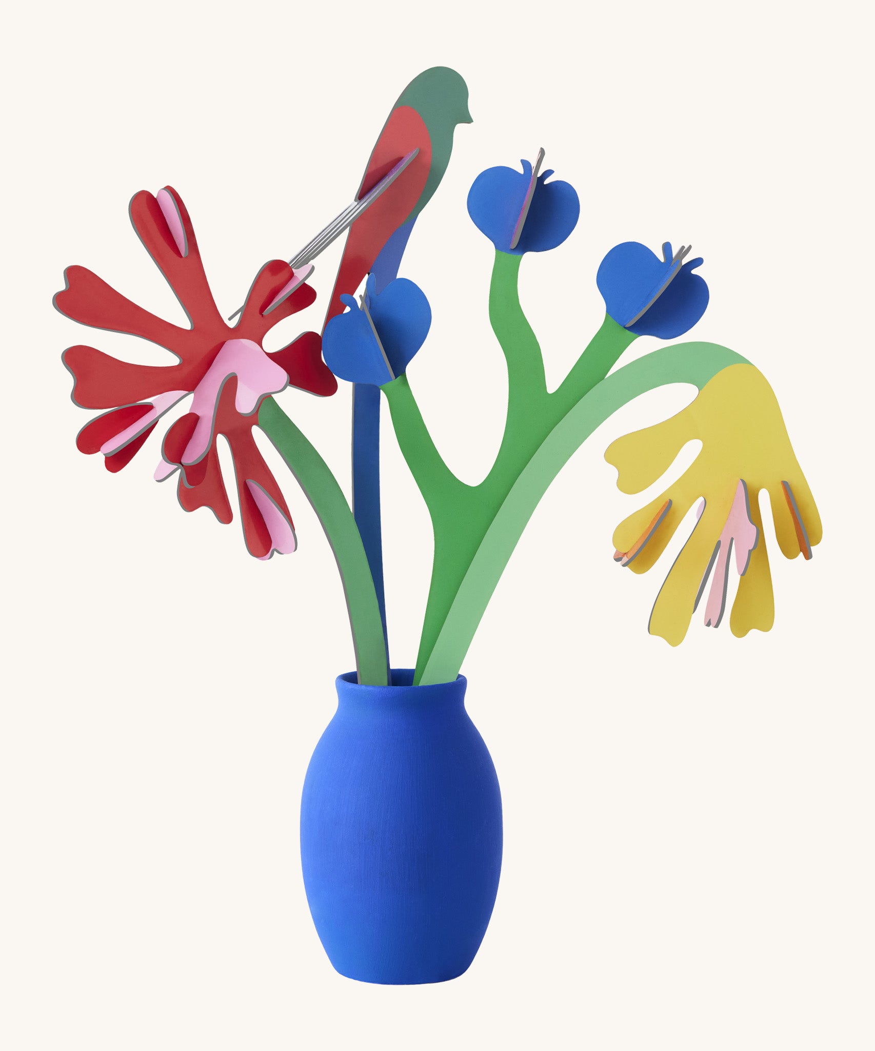 Studio roof small small paper bloom Matisse bouquet with  available at Babipur displayed in a blue vase