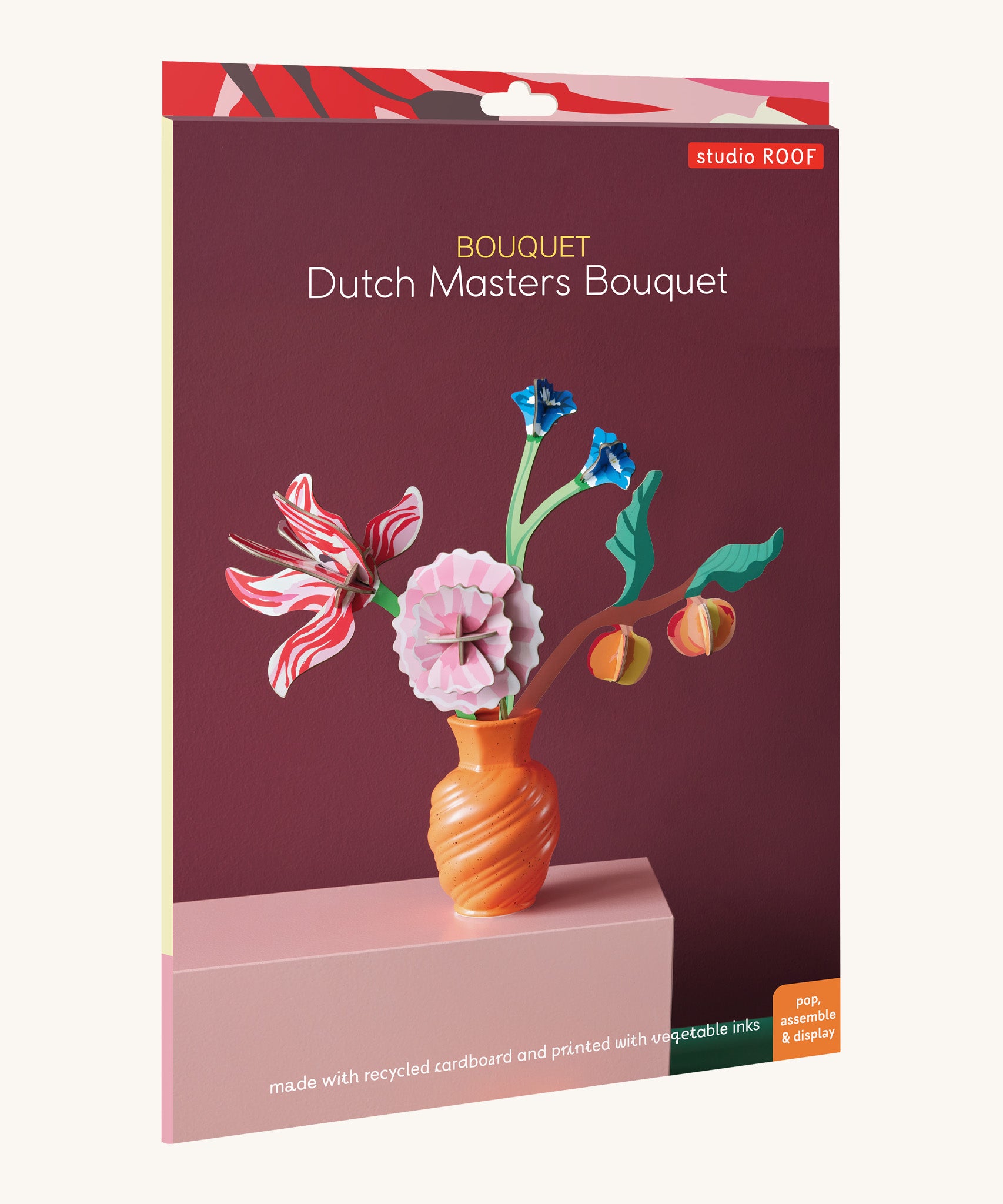 The cardboard packaging for the Studio roof small Dutch masters inspired bouquet decoration available at Babipur
