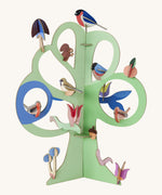 Studio roof singing tree from the capsule collection available at Babipur. A green tree decoration with different garden birds