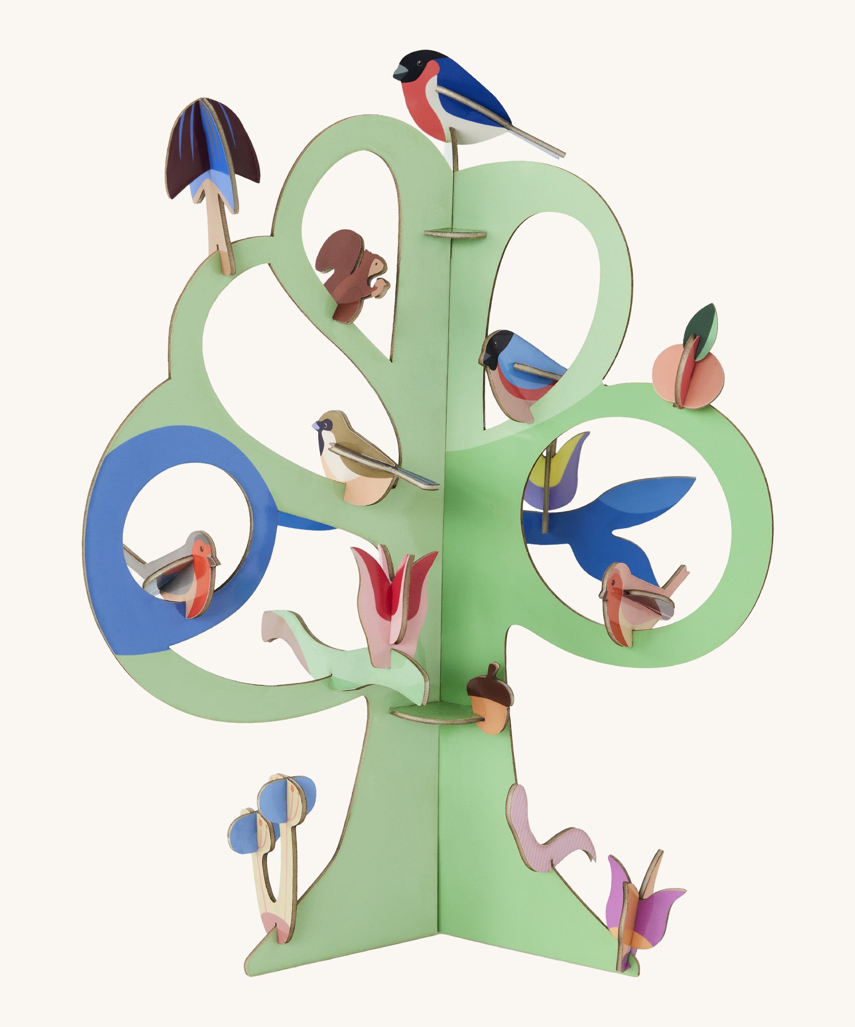 Studio roof singing tree from the capsule collection available at Babipur. A green tree decoration with different garden birds