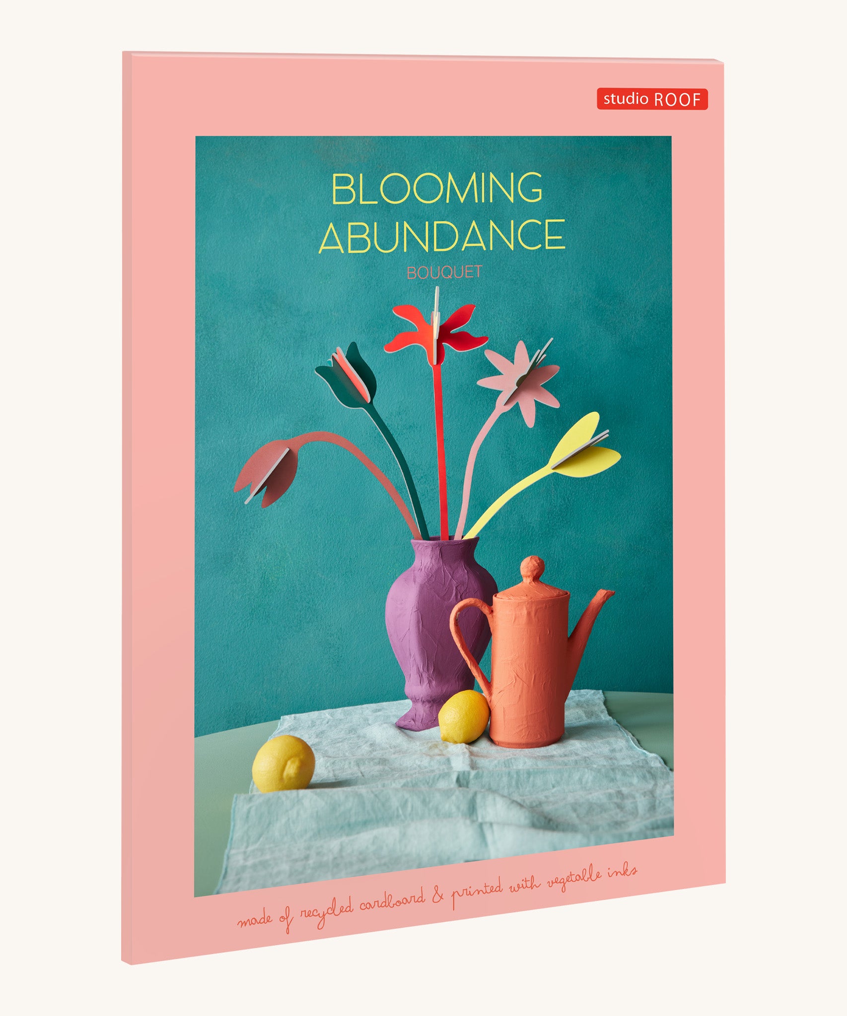 The pastel coloured cardboard packaging presenting the Studio Roof cardboard bouquet in blooming abundance colour way available at Babipur.