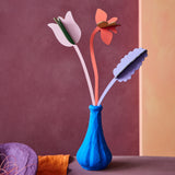 Studio Roof cardboard bouquet in Spring time surprise colour way available at Babipur. A DIY kit made from cardboard displayed in a homemade paper mache vase