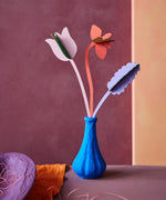 Studio Roof cardboard bouquet in Spring time surprise colour way available at Babipur. A DIY kit made from cardboard displayed in a homemade paper mache vase