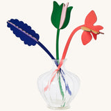 Studio Roof cardboard bouquet in Spring time surprise colour way available at Babipur. A DIY kit made from cardboard in a shape of different coloured flowers displayed in a glass vase