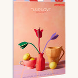 The pastel coloured cardboard packaging presenting the Studio Roof cardboard bouquet in tulip love colour way available at Babipur.