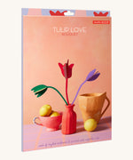 The pastel coloured cardboard packaging presenting the Studio Roof cardboard bouquet in tulip love colour way available at Babipur.
