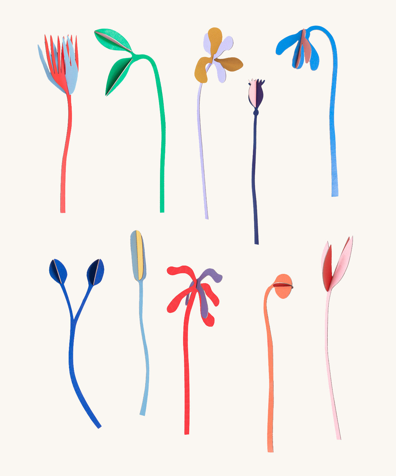 A flatlay showing the different coloured flowers from the Studio Roof cardboard bouquet giant set available at Babipur.
