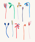 A flatlay showing the different coloured flowers from the Studio Roof cardboard bouquet giant set available at Babipur.