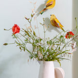 Studio Roof citrinella pair wall decorations available at Babipur hanging on a lightly coloured wall