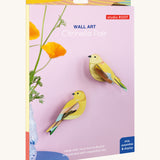 The cardboard packaging for the citrinella birds pair decoration available at Babipur.