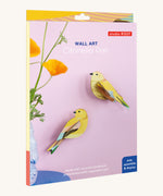 The cardboard packaging for the citrinella birds pair decoration available at Babipur.