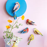 A group of Studio Roof garden birds hanging decorations including the Studio Roof citrinella pair available at Babipur.