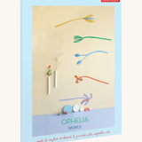 The pastel coloured packaging presenting the A Studio Roof cardboard Ophelia floral art mobile set available at Babipur.
