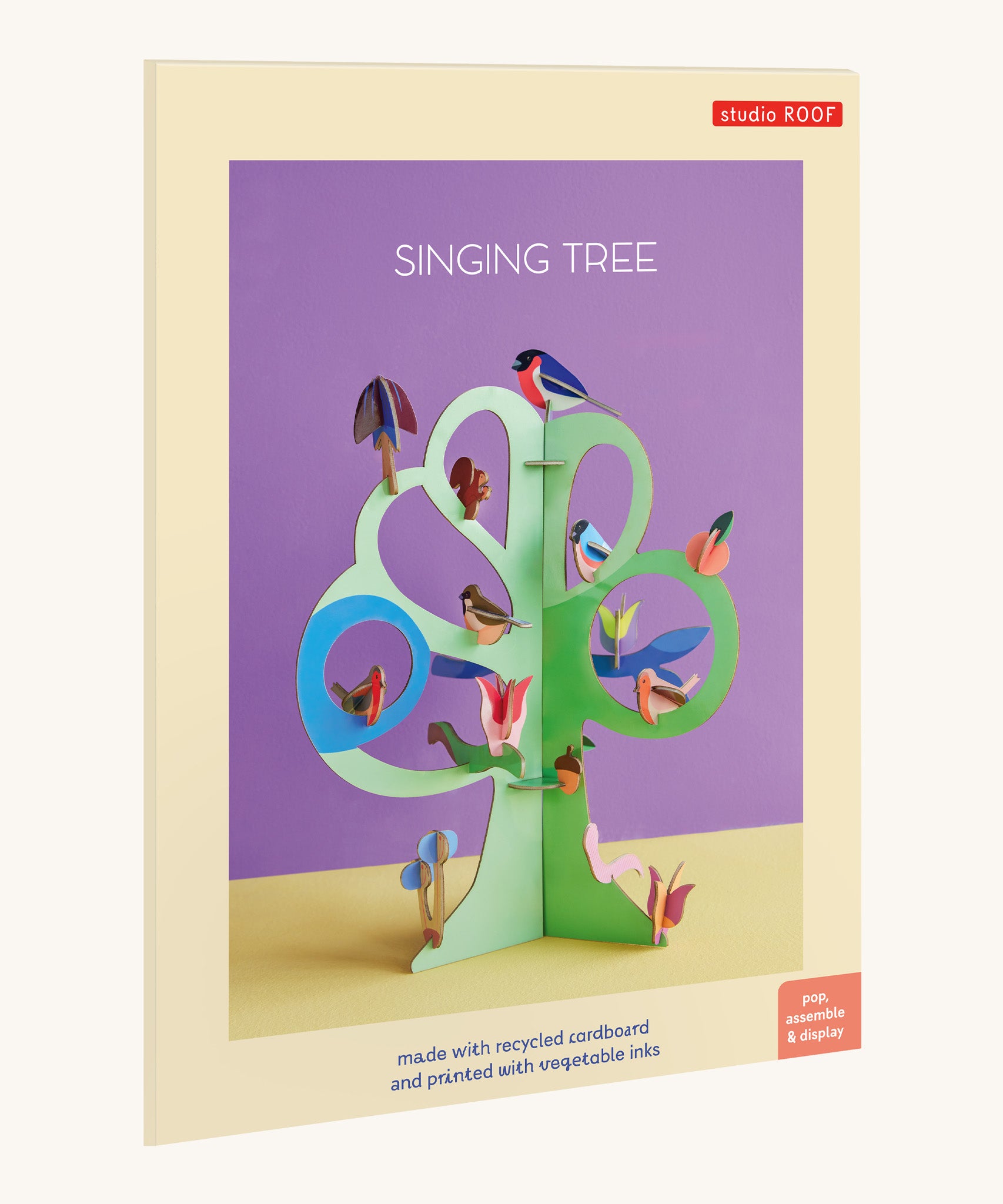 The cardboard packaging for the Studio roof singing tree from the capsule collection available at Babipur.